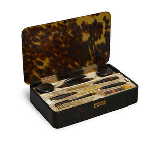 
	
		An Asprey tortoiseshell and gilt metal manicure set, late 19th/20th century,  the case of...