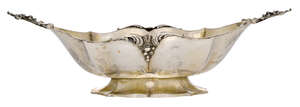 
	
		An Italian silver fruit dish, stamped 800, of elongated boat form with scalloped edges...