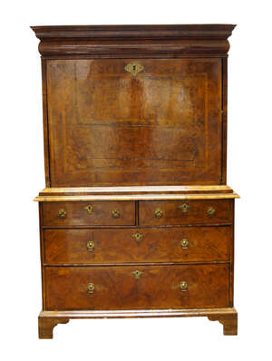 
	
		A Queen Anne walnut escritoire, c.1710, the moulded frieze with cushion drawer, above...
