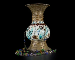 A hanging openwork copper alloy mounted pottery lamp,&nbsp;the body Kutahya, Ottoman Turkey, second...