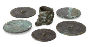 
	
		Five Chinese bronze mirrors, Han dynasty, each of plain circular form, 7-9cm diameter,...