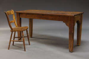 
	
		A Victorian pine kitchen table, the rectangular top on square tapering legs, 77cm high x...