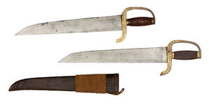 
	
		A Chinese wing chun bart cham dao (butterfly sword), 19th century, the wooden grips...