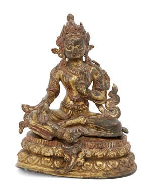 A Nepalese gilt bronze figure of Syamatara, 17th century, seated in lalitasana on a double lotus...