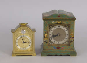 
	
		A Davall lacquered mantel clock, in the Georgian taste, mid 20th century, the case...