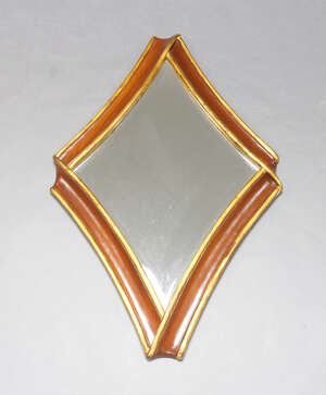 
	
		A mahogany and parcel gilt wall mirror, late 20th Century, of diamond form with bevelled...