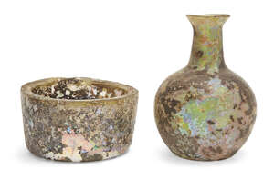 
	
		Two iridescent Roman glass vessels
		Circa 4th Century A.D. and Later, a globular glass...