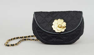 
	
		Chanel: a small quilted silk evening bad, with applied gold leather flower to front flap...