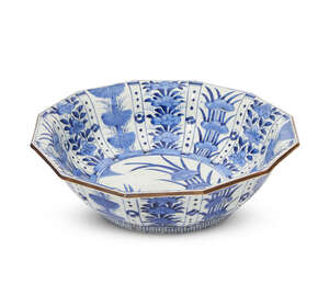 
	
		A Japanese Arita porcelain dodecahedral bowl, late edo period, painted in underglaze blue...