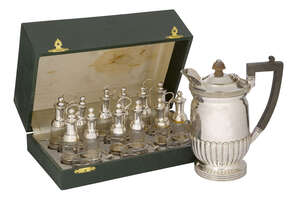 
	
		A boxed Italian silver cruet set comprising six trio cruets, each with two silver-capped...