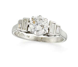 A platinum diamond single stone ring, the brilliant-cut diamond, weighing approximately 0.60 carats, in claw mount with graduated baguette-cut diamond two ston