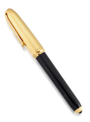 
	
		A gold plated and black lacquer fountain pen by Cartier, the black lacquer slightly...
