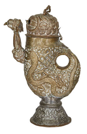 
	
		A Tibetan copper alloy ewer, 19th century, modelled as a bird, repoussé decorated with...