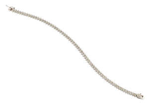 
	
		A diamond bracelet,  composed of three rows of circular-cut diamonds, length 17.0cm

	

