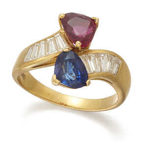 
	
		Garrard and Co, a ruby and sapphire ring, by Garrad & Co, set with a heart-shaped ruby...