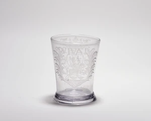 A Continental glass beaker, late 18th / early 19th century, of slightly waisted form, engraved...