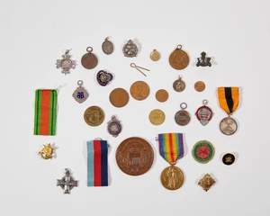 A mixed group of silver and other medals, coins and pendants, the group including:&nbsp;an Edwardian...