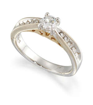 
	
		A diamond single stone ring, the brilliant-cut diamond in claw mount to channel-set...