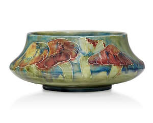 
	
		William Moorcroft (1872-1945), a Claremont pattern ceramic bowl retailed by Liberty & Co ...