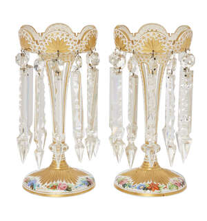 
	
		A pair of Bohemian white and clear glass lustre candle sticks, the white overlay...