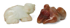 
	
		Two Chinese hardstone carvings, early 20th century, comprising a jadeite recumbent...