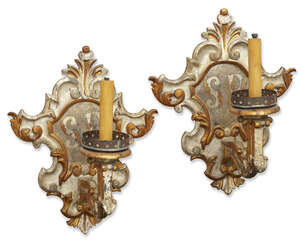
	
		A pair of Italian silvered and giltwood wall appliques, of rococo style, 19th century,...