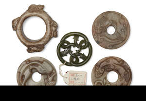 
	
		Five Chinese jade carvings, 18th-early 20th century, comprising a spinach jade plaque...