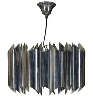 
	
		In the manner of Gaetano Sciolari, a chromed four light pendant light  
		c.1960  
		Of...