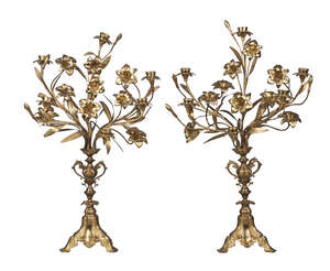 
	
		A pair of French gilt metal six light candelabra, 19th century, the branches emitting...