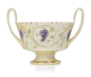 
	
		William Moorcroft (1872-1945), a Grape pattern twin-handled ceramic lustre bowl retailed...