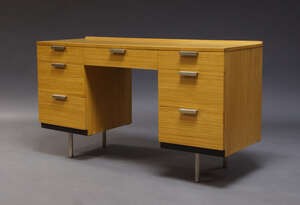 
	
		John and Sylvia Reid, a kneehole desk for stag, c.1960, with an arrangement of seven...