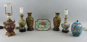 
	
		A pair of Chinese enamel vases, 20th century, overall decorated with flowers, on wooden...