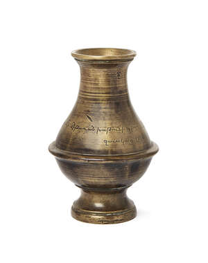 
	
		An Armenian brass vase with inscription, dated 1870AD, of squat form on a raised foot,...