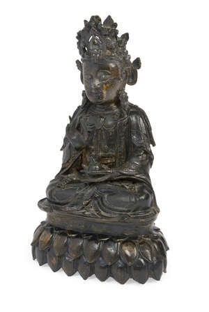 
	
		A Chinese bronze figure of Guanyin, Ming dynasty, with traces of gilt throughout, seated...