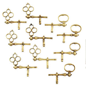 
	
		A group of ten 20th century gold watch keys, of 'T-bar' form with loop or openwork...