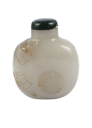 
	
		A Chinese pale green jade snuff bottle, 19th century, of ovoid form, carved in low relief...