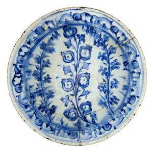 
	
		An Iznik blue and white pottery bowl, Turkey, 17th century, of shallow form with everted...