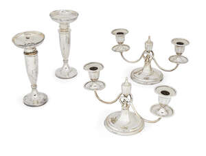 Two pairs of silver candlesticks, one pair of low, twin candelabra design, Sheffield, c.1905, Fordham & Faulkner, with octagonal tapering bases and sconces, dr