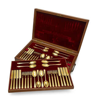 
	
		A boxed canteen of silver-gilt cutlery by Carrington & Co., London, the spoons hallmarked...