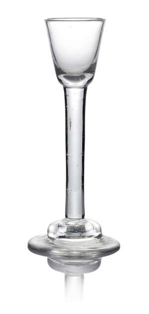A George II plain stem cordial glass, c. 1740, with domed foot, 17.5cm high