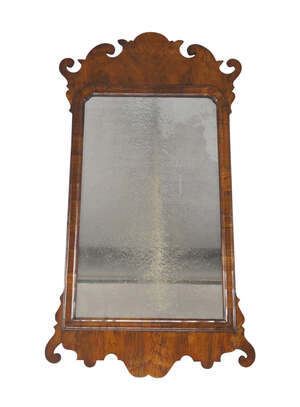 
	
		A George III walnut fret work mirror, with original glass plate, 93 x 49cm

	

