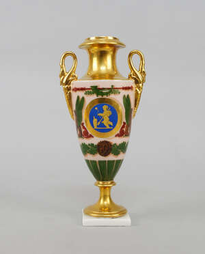 
	
		A French porcelain Empire style vase, late 19th century, with swan neck handles, on a...