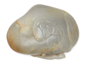 
	
		A large Chinese green and russet jade pebble pendant, early 20th century, the whole...