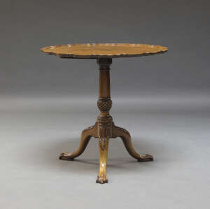 
	
		A George III style mahogany tilt top occasional table, 19th Century, the pie crust top,...