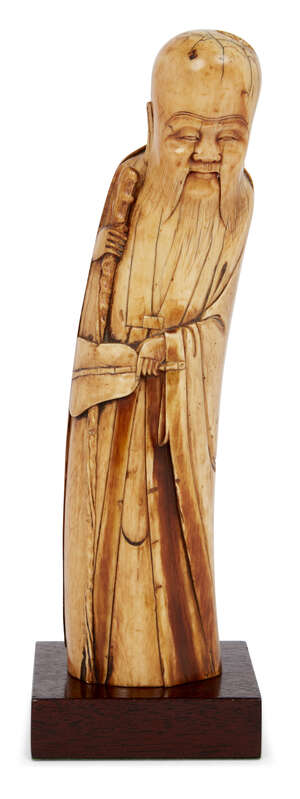 
	
		A Chinese ivory figure of Shoulao, Ming dynasty, modelled standing, holding a staff in...