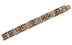 A Victorian, gold, Scottish agate bracelet, designed as five curved rectangular hinged panels enclosing a geometric pattern set with cornelian, bloodstone, ban