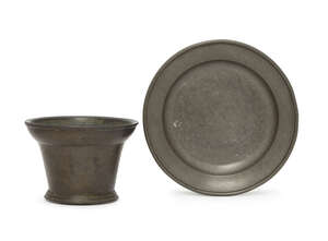 
	
		A small Dutch bronze mortar, 18th century, of tapering form, 9.5cm high; together with a...