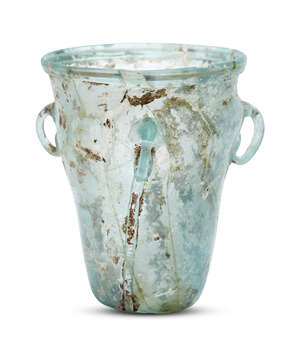 
	
		A Byzantine pale bluish-green glass hanging lamp, 6th-7th century, with three loop...