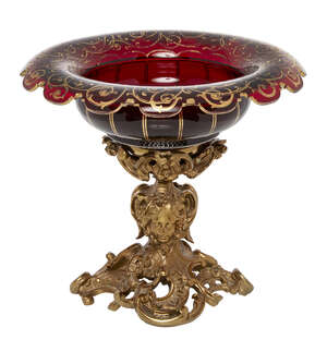 
	
		A Continental bohemian ruby glass and bronze centre piece, late 19th century, the base...