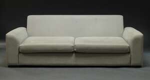 
	
		A contemporary two seater sofa b Jameson Seating, upholstered in beige fabric, with two...